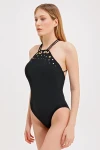 SWIMSUIT WITH GOLD ACCESSORY DETAIL